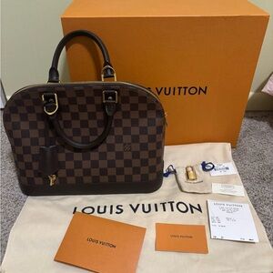 Louis Vuitton Brown and like new!